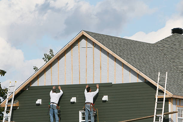 Professional Siding Contractor technician working in Akron, CO